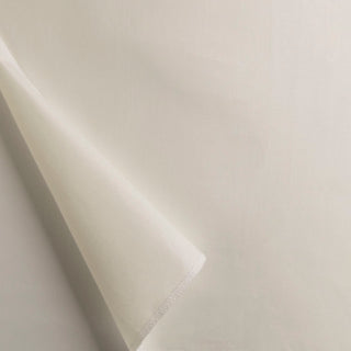 Alendel Drapery Lining. A close-up view of a white satin fabric with a slight sheen, showing a small section folded over to reveal the reverse side.