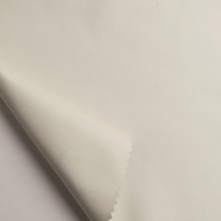 Alendel Blackout Collection. 
A close-up view of a white, solid-colored piece of fabric with a slight sheen, indicating its synthetic composition.
