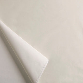 A close-up view of a white fabric with a smooth texture, likely a blackout lining fabric.