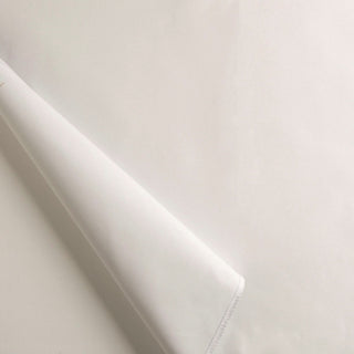 Alendel Blackout Collection A rolled piece of plain white fabric.