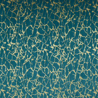 Close-up view of a velvet fabric with a geometric pattern in a multicolor design.
