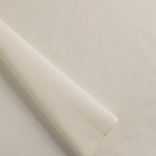 Alendel Fabric Lining. A close-up image of a beige-colored fabric with a focus on its texture and a slight fold.