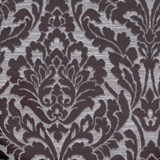 Close-up of a brown damask pattern fabric.