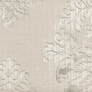 Close-up of a beige fabric with a floral pattern and embossed texture.