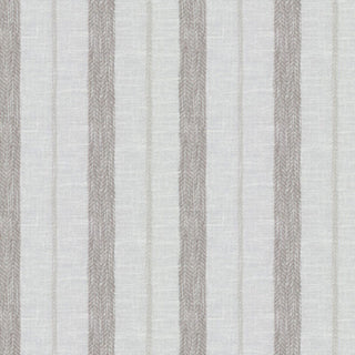 A close-up of a beige fabric with a striped pattern.