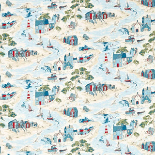 Fabric with a nautical pattern featuring boats, lighthouses, and coastal houses on a blue background.