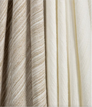 Kravet Aloft Drapery collection Close-up of striped fabric with beige and white pattern