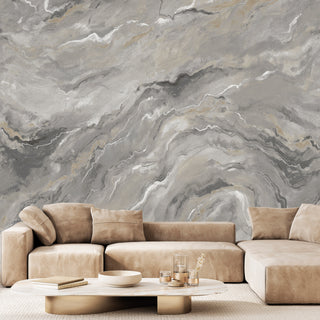 Beige sofa in front of a  JF Fabric Metaphore wallpaper with a marble-patterned 