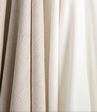 Kravet Aloft drapery collection Close-up of beige and white textured fabric
