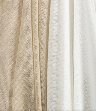 Kravet Aloft drapery collection Close-up of beige and white textured fabric
