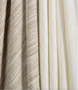 Kravet Aloft drapery collection Close-up of striped fabric with beige and white pattern