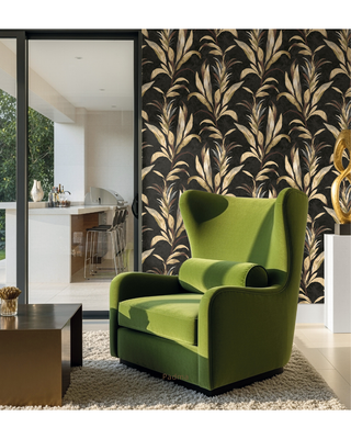 A modern wingback armchair upholstered in olive green velvet, positioned in a stylishly decorated room with a black and beige palm-patterned wallpaper background.