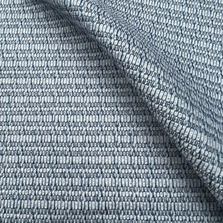 JF Fabrics St. Tropez fabric collection. A close-up view of a textured ice-blue and cream fabric with a subtle pattern