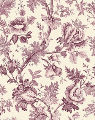 A close-up view of the Cabris wallpaper swatch from the Crown Provence collection. The pattern is a classic French Toile de Jouy, featuring winding botanical branches, large ornate blossoms, detailed leaves, and hanging pomegranates or figs. The entirely monochromatic design is rendered in shades of timeless reds, standing out against a crisp cream background. The backdrop features a subtle linen-textured faux weave, giving this elegant print a warm, high-end fabric-like depth.