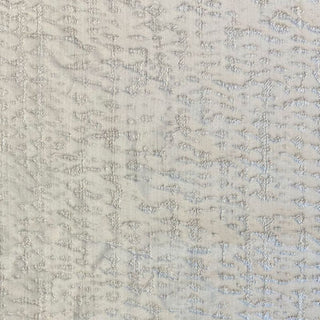 Textured beige fabric pattern