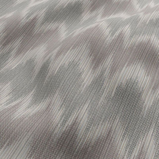 Close-up of textured gray fabric with a subtle pattern