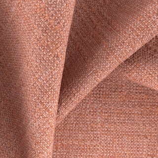 Close-up of blush coral textured fabric  by JF Fabrics Lennon collection