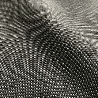 JF Fabrics St. Tropez fabric collection. Close-up of faux linen texture onyx black, and charcoal and  fabric with a subtle pattern