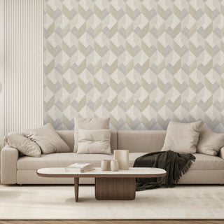 JF Fabric Intrigue wallpaper collection featured in theis Modern living room with a beige sofa, coffee table, and JF Fabric Intrigue geometric patterned wallpaper.