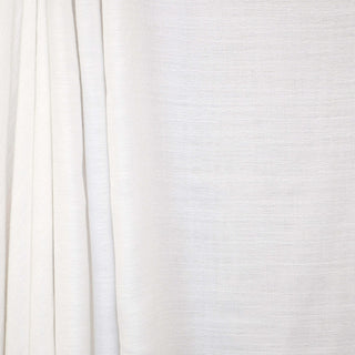 JF Fabrics St. Tropez drapery fabric. Close-up of soft white fabric texture