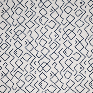JF Fabrics Marisol fabric collection. A close-up view of a navy geometric pattern on a white background