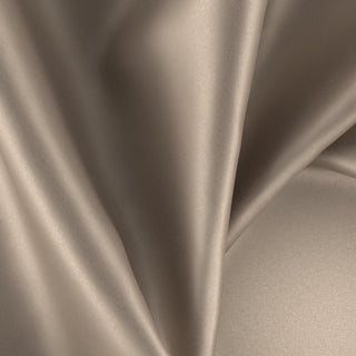 Close-up of golden brown satin fabric swatch with folds from JF Fabric Pixie collection