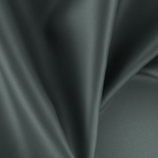 Close-up of teal fabric swatch with folds from JF Fabric Pixie collection