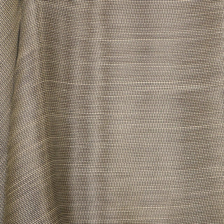 JF Fabrics St. Tropez drapery fabric collection. Close-up of a textured beige tan fabric with a grid pattern