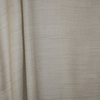 JF Fabrics St. Tropez drapery fabric collection. Close-up of cream sandy beige fabric with a subtle texture