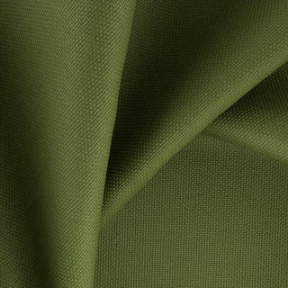 JF Fabrics Splash fabric. Close-up of blue fabric with a textured pattern in forest green