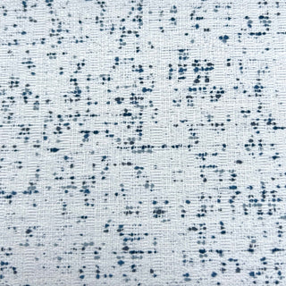 JF Fabrics Marisol collection, close-up view of a speckled boucle blue and white patterned fabric swatch