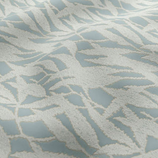 Textured patterned wallpaper with geometric design in blue and gray tones