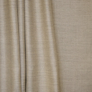 JF Fabrics St. Tropez drapery fabric collection. Close-up of sand beige fabric with a subtle texture