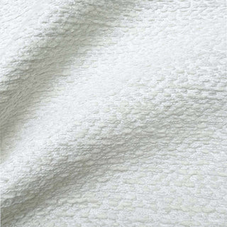 JF Fabrics St. Tropez fabric collection. Close-up of textured chevron white cream fabric with a subtle pattern