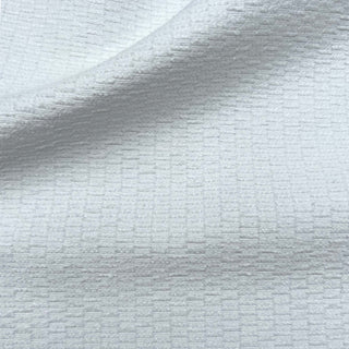 JF Fabrics St. Tropez fabric collection. Close-up of textured  chenille performance fabric in white fabric