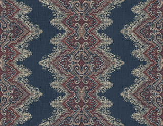 A wallpaper swatch from Crown’s Provence collection featuring the Valensole pattern, with an ornate, symmetrical design of paisley‑inspired motifs, floral details, and scrolling shapes arranged in a vertical zigzag layout. Deep red and blue tones blend with beige accents, creating a rich, woven look that evokes the elegance and texture of traditional decorative textiles.