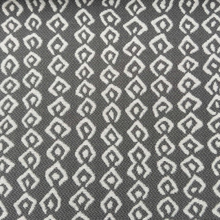 JF Fabrics Marisol collection, close-up view of pattern with white shapes on a dark gray background