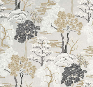 Close-up swatch of Crown's Chinoiserie collection wallpaper in the Mori Trees pattern. This detailed, illustrative design features a beige background filled with a stylized forest scene inspired by traditional woodblock prints. Various species of trees—including weeping willows, pines, and leafy maples—are rendered in a palette of gold, soft gray, white, and black. Linear stitching effects define the rolling hills, clouds, and foliage, creating a rich, scenic, and textured landscape.