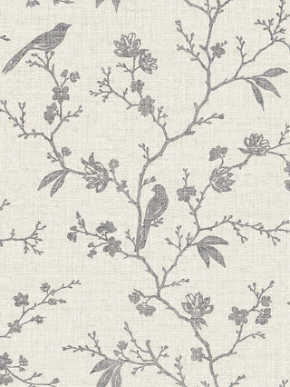 Close-up swatch of Crown's Chinoiserie collection wallpaper in the Yuye Silhouette pattern. The monochrome design features a textured, off-white background with a subtle, fabric-like linen weave texture. Elegant, branching silhouette trails spread across the canvas in a muted gray tone. The branches are detailed with delicate leaves, stylized blossoms, and small perched songbirds, creating a clean, classic, and understated botanical aesthetic perfect for a timeless room design.